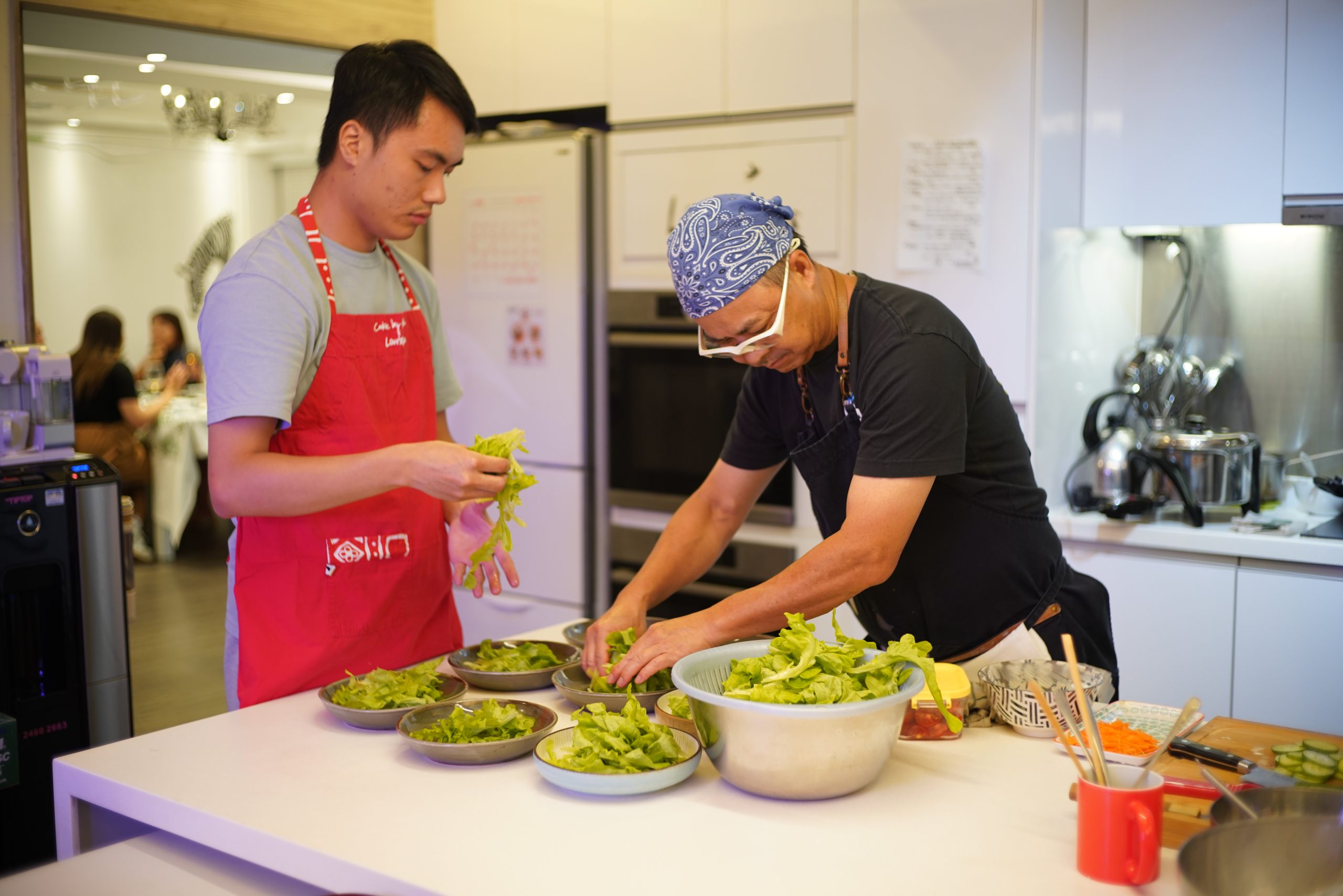 Chefs plating dishes
